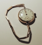 damske-celozlate-naramkove-hodinky-omega